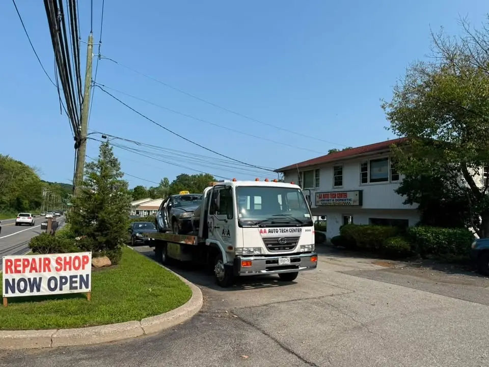 AA Auto Tech tow truck in front of the shop on Crompond Road